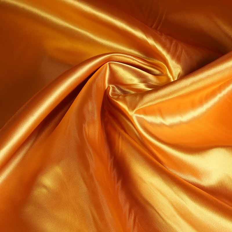 Tissu satin bronze