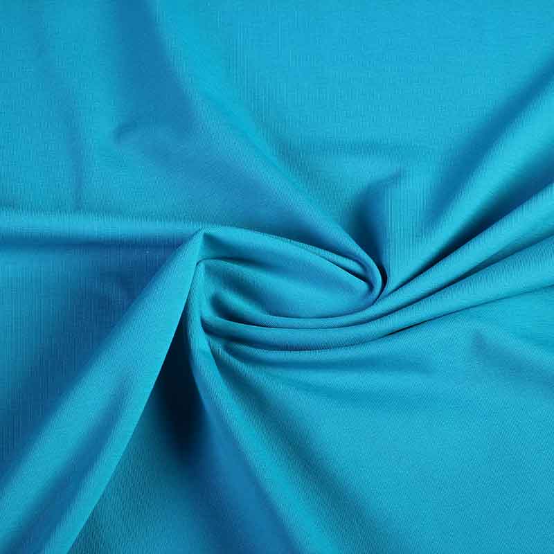 Tissu tricot bleu-vert clair