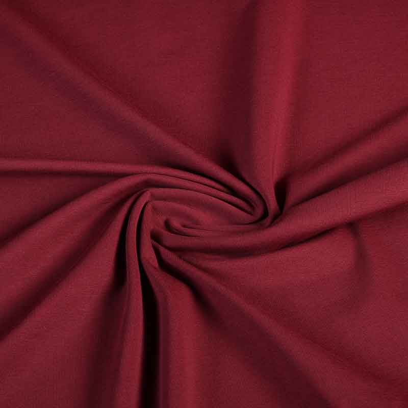Tissu tricot rouge vin