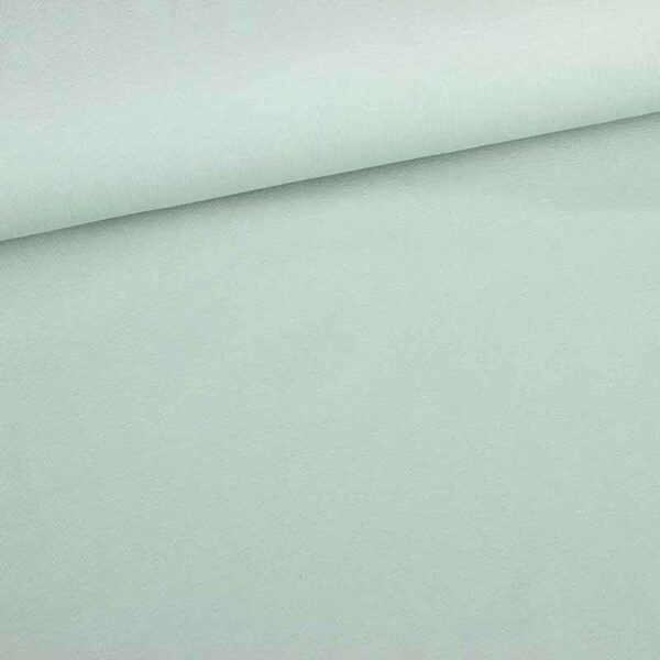 Tissu tricot vert de gris clair