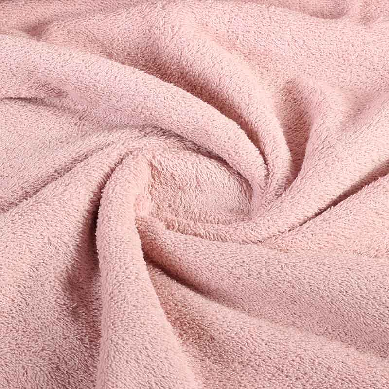 Tissu éponge rose poudré
