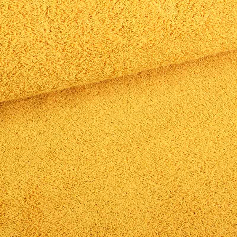 Tissu éponge jaune ocre