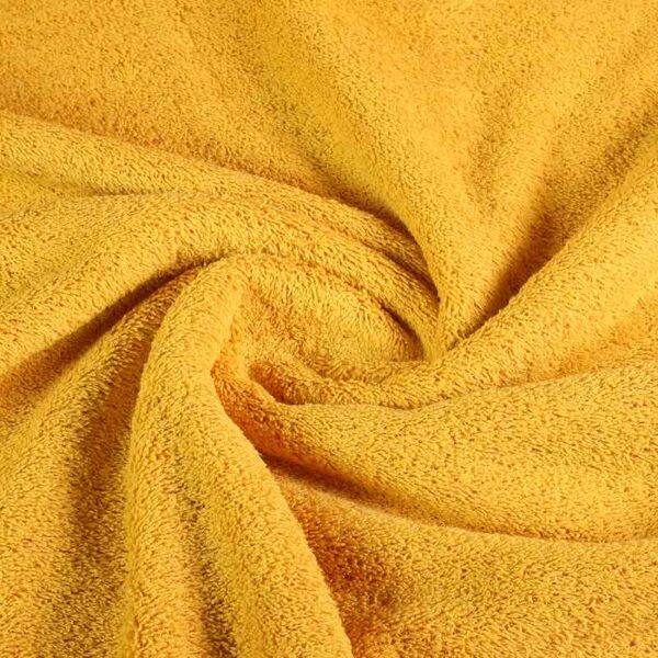 Tissu éponge jaune ocre