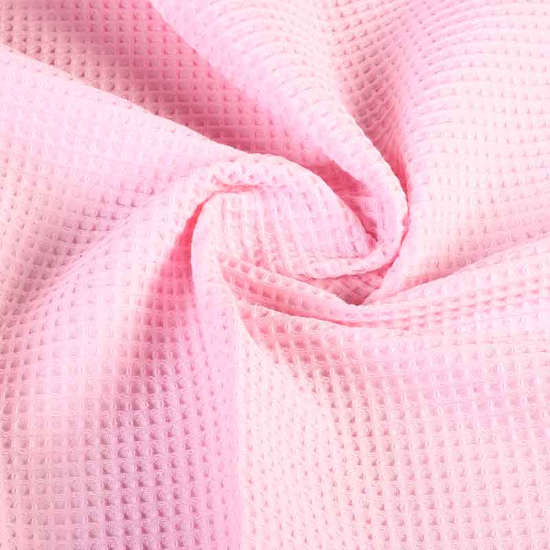 Tissu gaufré rose bébé