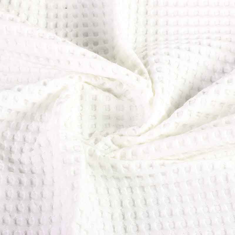 Tissu gaufré grand écru