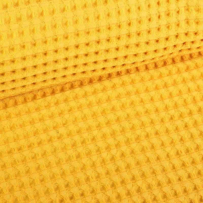 Tissu gaufré grand jaune ocre
