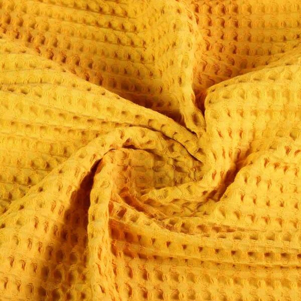 Tissu gaufré grand jaune ocre