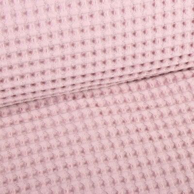 Tissu gaufré rose poudré