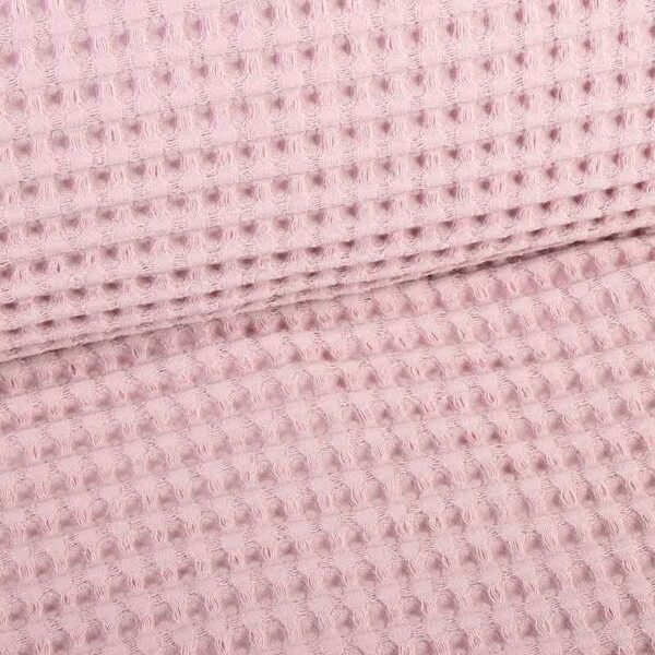 Tissu gaufré rose poudré