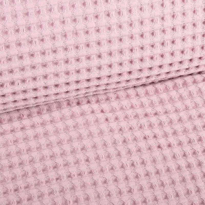 Tissu gaufré rose poudré