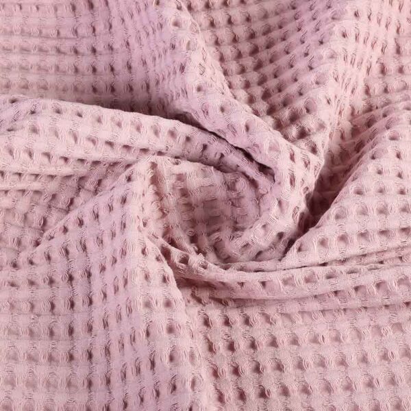 Tissu gaufré rose poudré