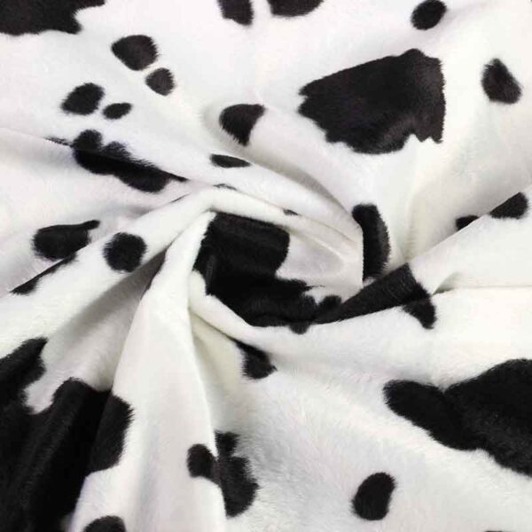 Tissu Velboa imprimé vache noir blanc