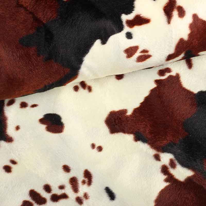Tissu velboa imprimé vaches marron noir