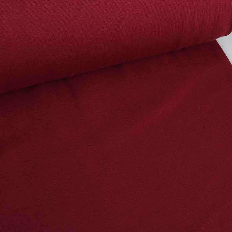 Tissu bord rouge vin