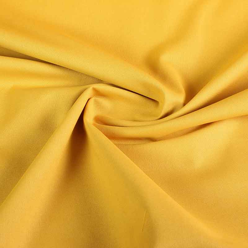 Tissu coton ocre jaune