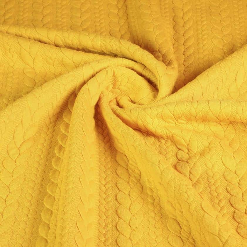Tissu câble jacquard tricot ocre