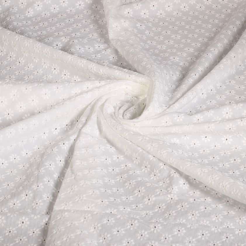 Tissu broderie fleur blanc