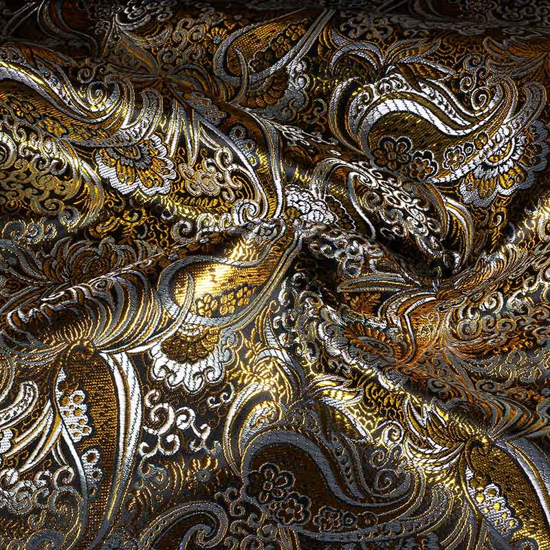 Tissu Jacquard paisley noir et or