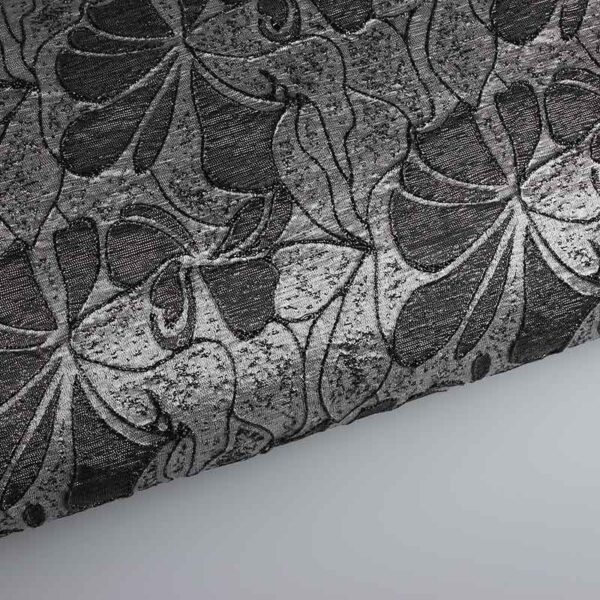 Tissu Jacquard fleur ton sur ton lurex noir