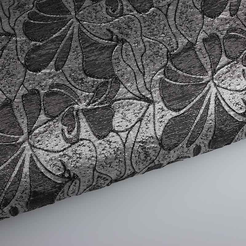 Tissu Jacquard fleur ton sur ton lurex noir