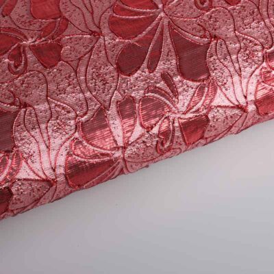Tissu jacquard fleur ton sur ton lurex rouge