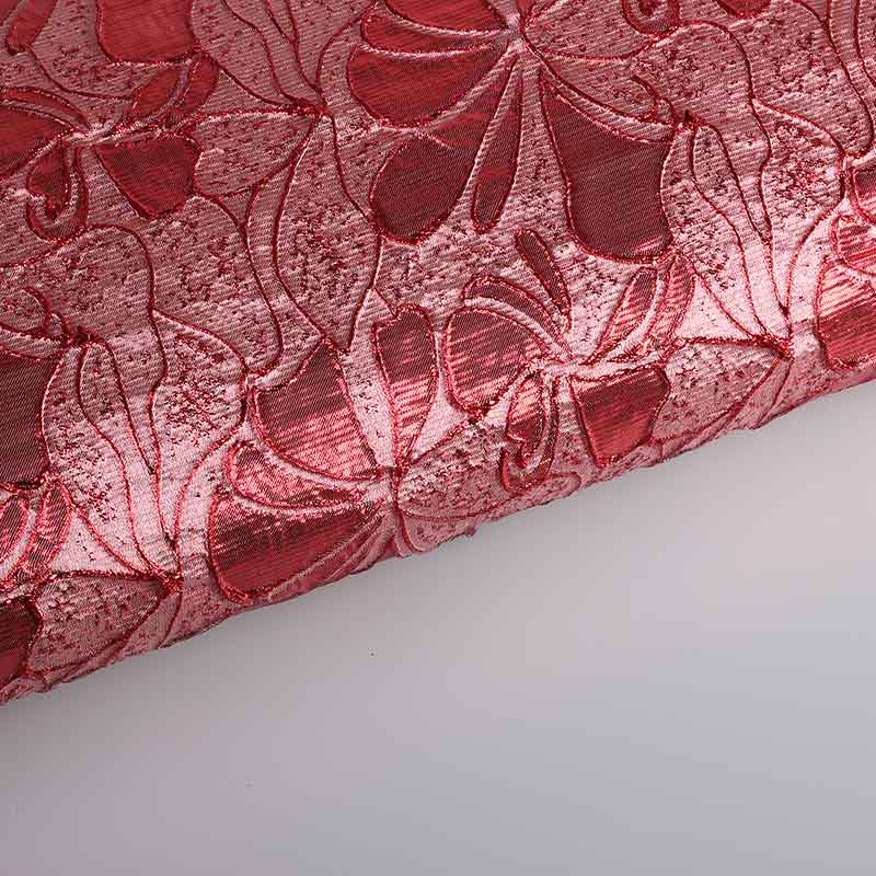 Tissu jacquard fleur ton sur ton lurex rouge