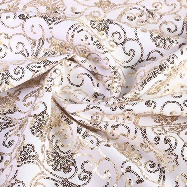 Tissu Terlenka blanc avec paillettes fantaisie dorées