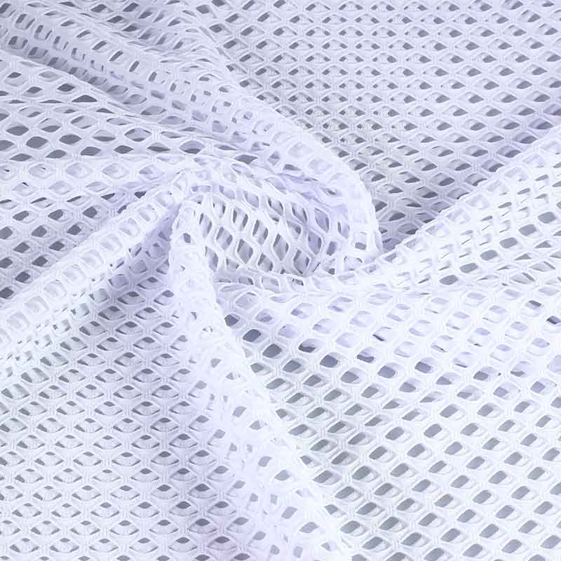 Tissu filet élastique grossier blanc