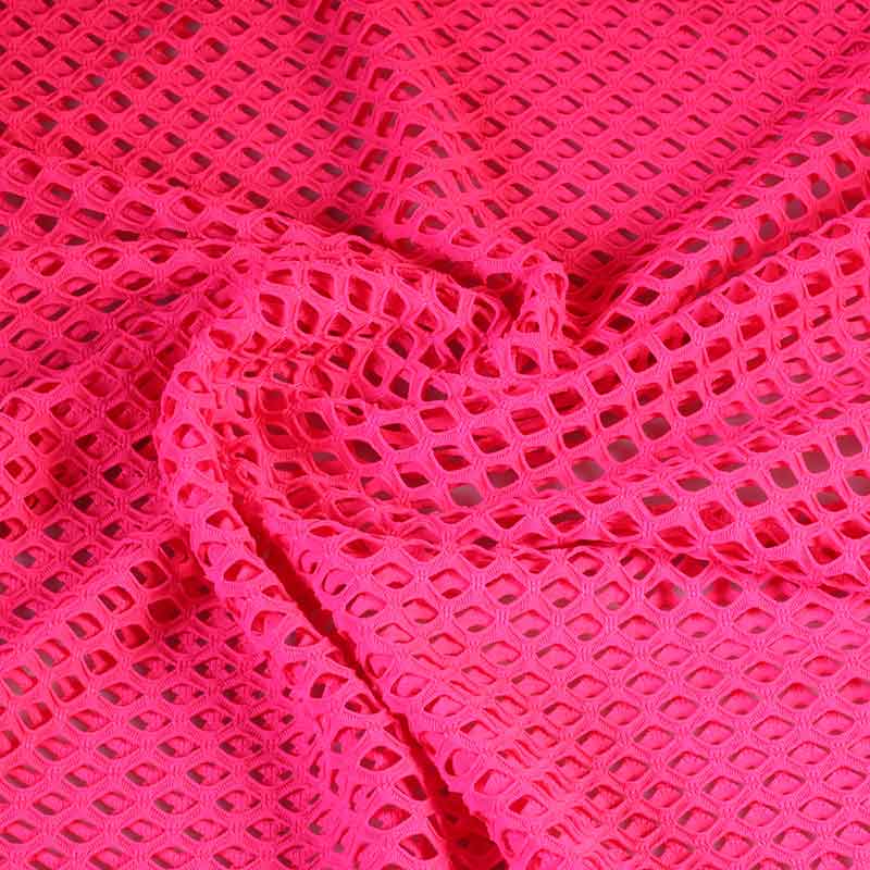 Tissu filet élastique grossier fluor rose