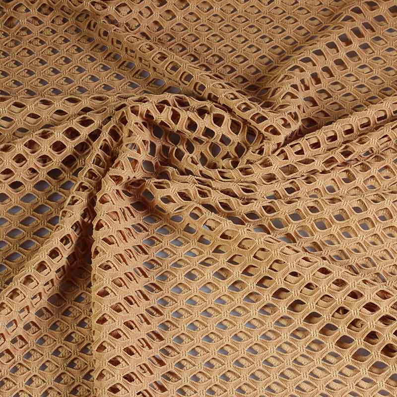 Tissu filet grossier élastique couleur peau