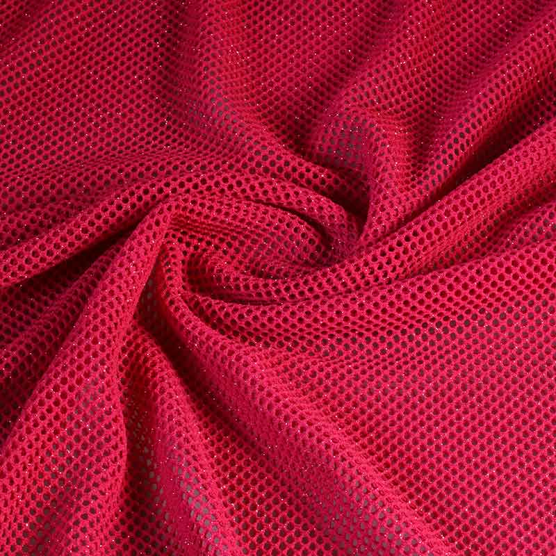 Tissu filet paillettes élastique fuchsia