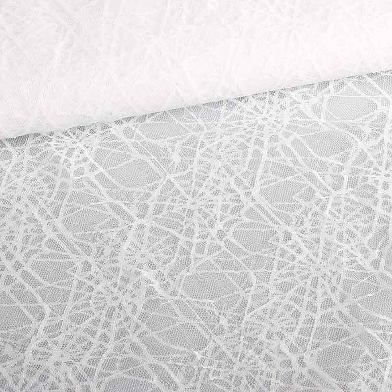 Tissu dentelle toile d'araignée blanc