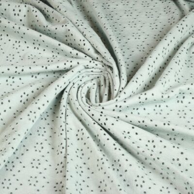 Tissu jersey broderie vert ancien