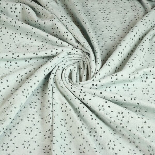 Tissu jersey broderie vert ancien