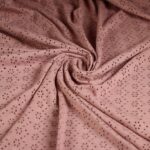 Jersey broderie stof donker oud roze