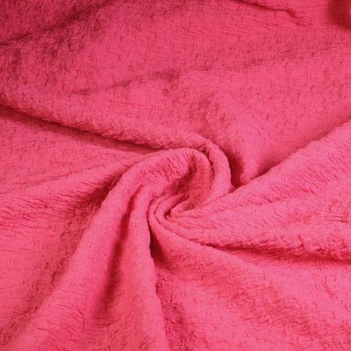 Tissu tricot broderie fuchsia