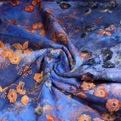 Tissu Poppy broderie tie dye bleu marron