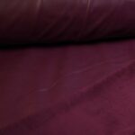 Tissu stretch simili cuir / velours bordeaux